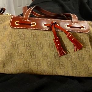 NEW DOONEY NOW $52 NEW DOONEY AND BOURKE EMBOSSES LOGO BAG
